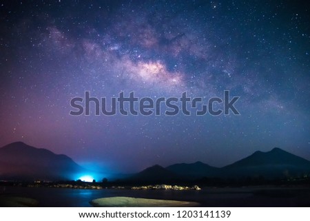 Milky Way galaxy landscape rivers and light with mountains background in the  dark night sky 