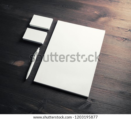 Blank stationery template on vintage wood table background. Mockup for branding identity for designers.