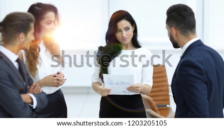 business team discussing a financial chart