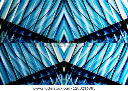 Windows reflecting blue sky. Multiple exposure photo of office building exterior fragment. Abstract glass background on the subject of modern architecture, business or technology.