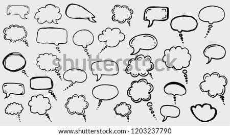 Doodle chat cartoon bubbles. Hand drawn vector set. Isolated on white background