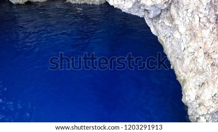 The Blue Cave, famous for its navy blue in Suluada, Antalya, Turkey.