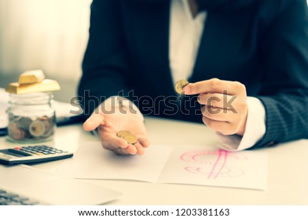 Business woman with a coins