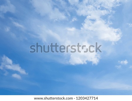 Clear sky with clouds , blue background