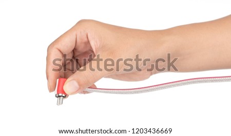 Hand holding Headphone Jack converter L Shape isolated on white background