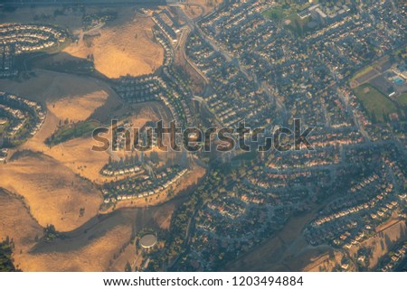 Aerial view of San Jose, California at sunrise shot from an airliner