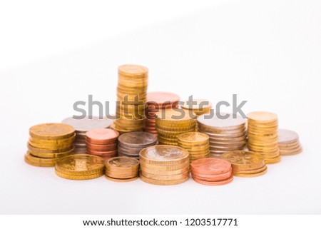 Money US dollars and Euros on a white background, different monetary coins. Exchange bitcoin for a dollar and euro. Worldwide cryptocurrency and digital payment system.