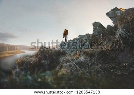 Hiker photographs landscape