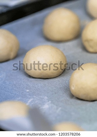 Small Bread Dough Balls Placed on Cooking Paper on Pan - Ready to be Baked, Kitchen Set