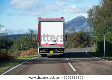 Delivery lorry from supermarket online shopping living travelling and working in remote countryside location and rural Scottish island