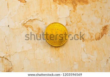 Crypto currency Gold Bitcoin, BTC, macro shot of Bitcoin coins on old paint background,  bitcoin mining concept