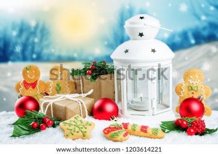 Christmas lantern with gifts, colored balls on a winter background. Christmas background concept