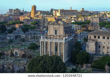 Skyline of capital of Rome, in a Roman Forum, a rectangular forum surrounded by the ruins of several important ancient government buildings at the center of the city. Most important city of Italy.
