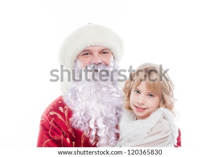 Santa Claus gives gifts to the pretty little girl