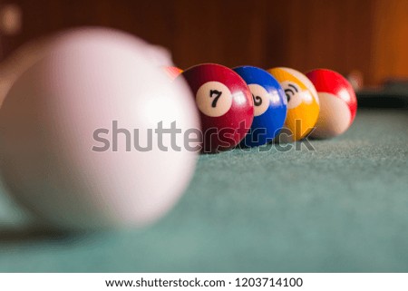 pool table / billiard with green taco and colored balls