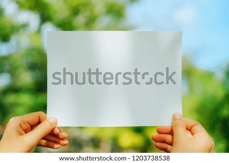 Copy space of white paper on nature background. Use for put text on blank space.