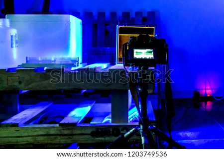 Dark studio In science, modern microscope in a research lab on a dark blue background. High resolution studio image. blurred photo.