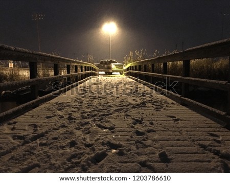 night time snow bridge 