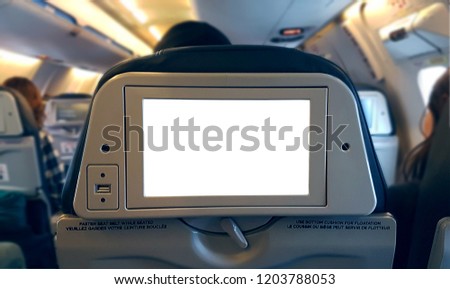 Blank sign template on passenger media screen on board an airliner,