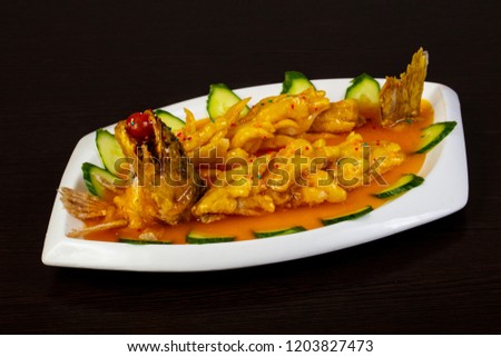 Chinese cuisine pike perch with sauce