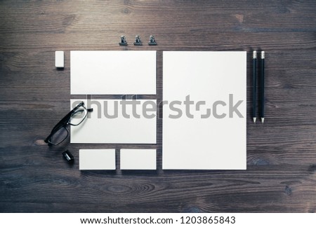 Blank stationery set on wooden background. Template for branding identity. For graphic designers presentations and portfolios. Top view. Flat lay.