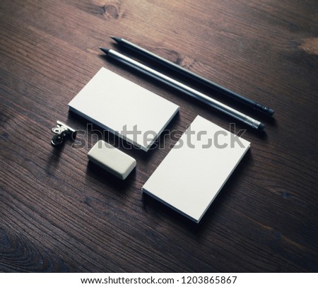 Blank stationery and corporate identity set on wooden background. Mock-up for graphic designers portfolios.
