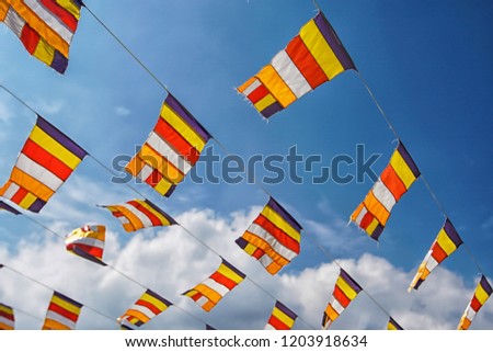 Buddhist Flag with blue sky