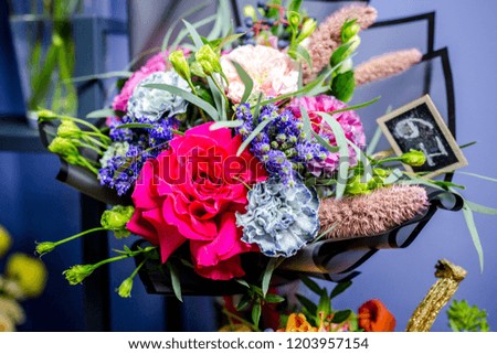 delicious edible bouquet of flowers and food in a flower shop