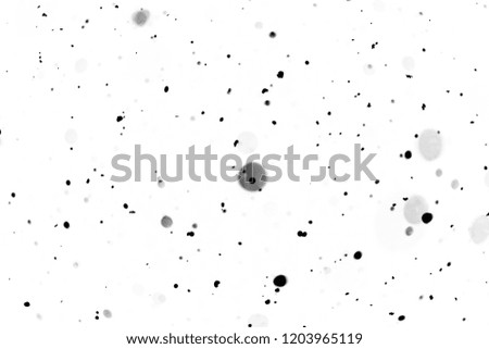 black bokeh on a white background blurry