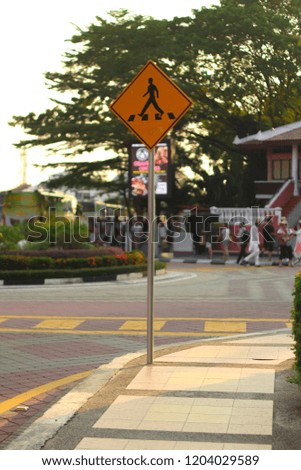 a zebra crossing sign with blurred background at beautiful city of Melaka, Malaysia. 