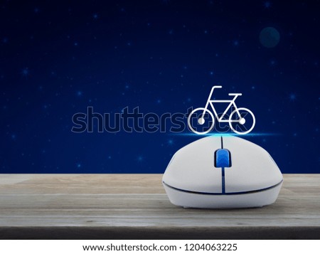 Bicycle flat icon with wireless computer mouse on wooden table over fantasy night sky and moon, Business bicycle service shop online concept