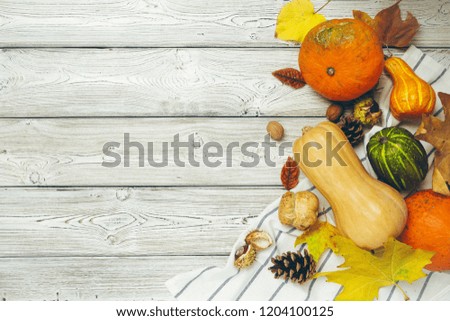 Pumpkin on old rustic wooden table.