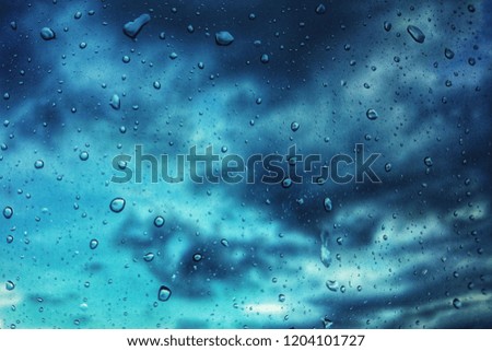 Condensation of water on the window,Rain drops on the glass,Background.