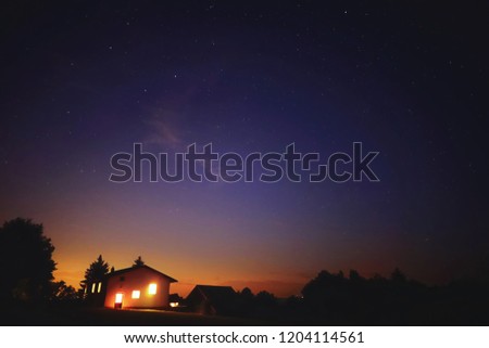 House Under Mysterious Star Scattered Night Sky