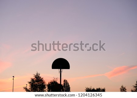 basketball basket with morning sky