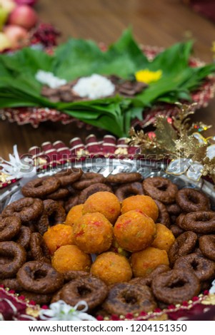 Offerings during a Hindu wedding ceremony, delicious cookies or sweets are usually presented by both families as gifts or sometimes as an honorable gesture towards the new family.