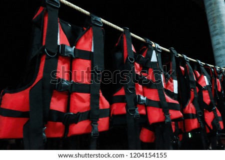Life jacket hanging on the rope