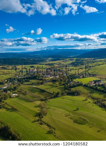 Aerial view on Lutowiska village in Bieszczady mountains in Poland - drone landscape.
