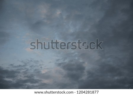 Natural light colored clouds and sky. Beautiful background of air space in the blue sky. The best image of heaven in the autumn clouds of natural background.