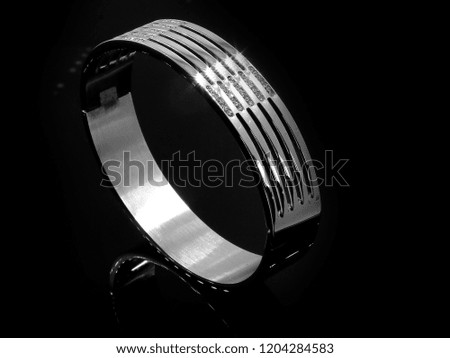 Jewelry, ladies' bracelet. Stainless steel. One background color