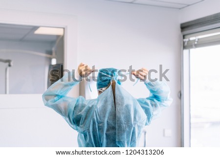 Preparing for surgery. Operating room in the hospital. A nurse surgeon Royalty-Free Stock Photo #1204313206