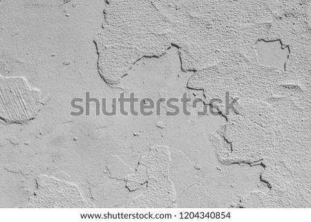 White stone texture, flaking old primer