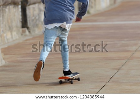 teenager skating on the street
