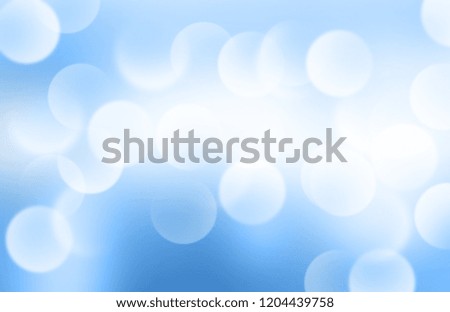 Lights or blurred bokeh on blue gradient background.