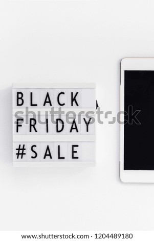Creative Top view flat lay promotion composition Black friday sale text on lightbox tablet white background copy space Template Black friday sale mockup fall thanksgiving promotion advertising