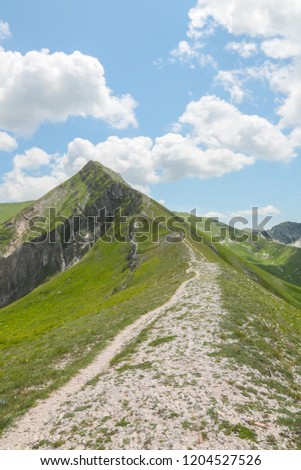 Ferratina del Berro is a mountain peak that hikers can get to via the Valley of Panic, named aptly for it's sheer drop into the valley below. During the summer, this range in Marche, Italy, is silent,