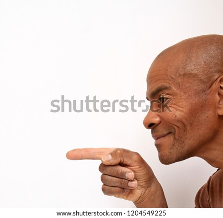 happy man pointing his finger stock photo