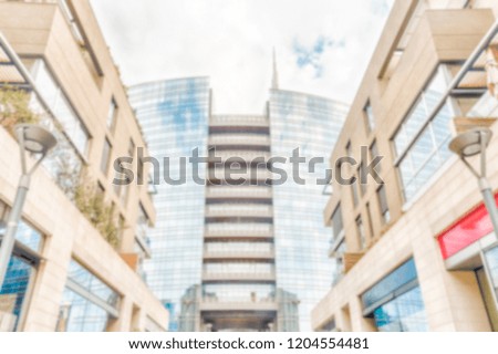 Defocused background with modern buildings, Porta Nuova financial district, Milan, Italy. Intentionally blurred post production for bokeh effect