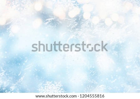 Winter background.  Holiday glowing backdrop. Defocused Background With Blinking Stars. Blurred Bokeh.