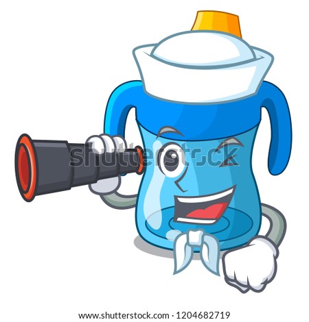 Sailor with binocular cartoon baby drinking from training cup